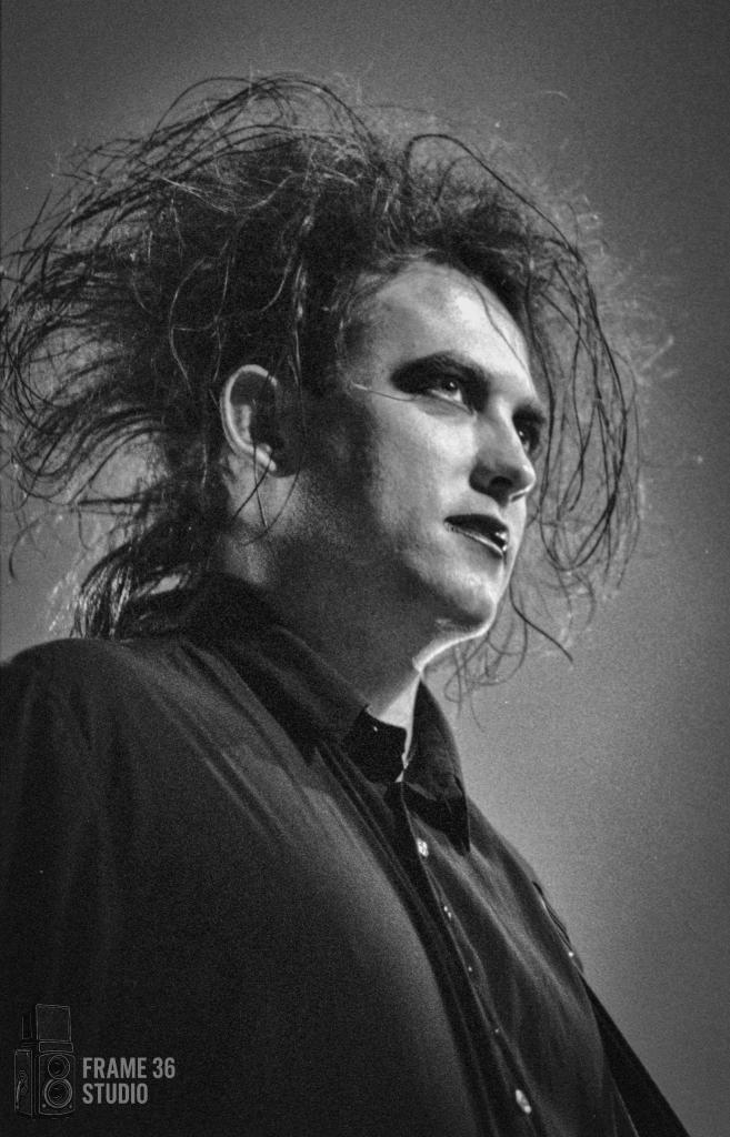 Robert Smith Environmental portrait of Robert Smith in between songs at a Cure concert.